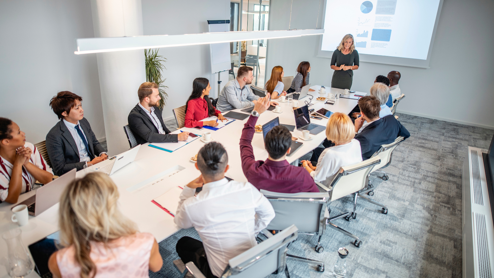 ecommerce team discussing logistics performance and operational strategy in meeting room
