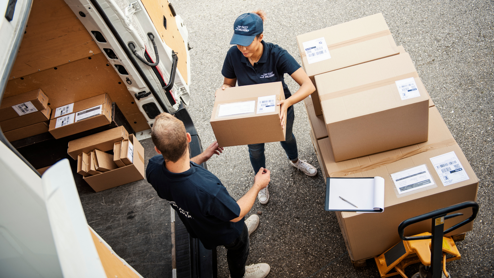 last mile delivery operations showing parcel handoff between delivery staff and van
