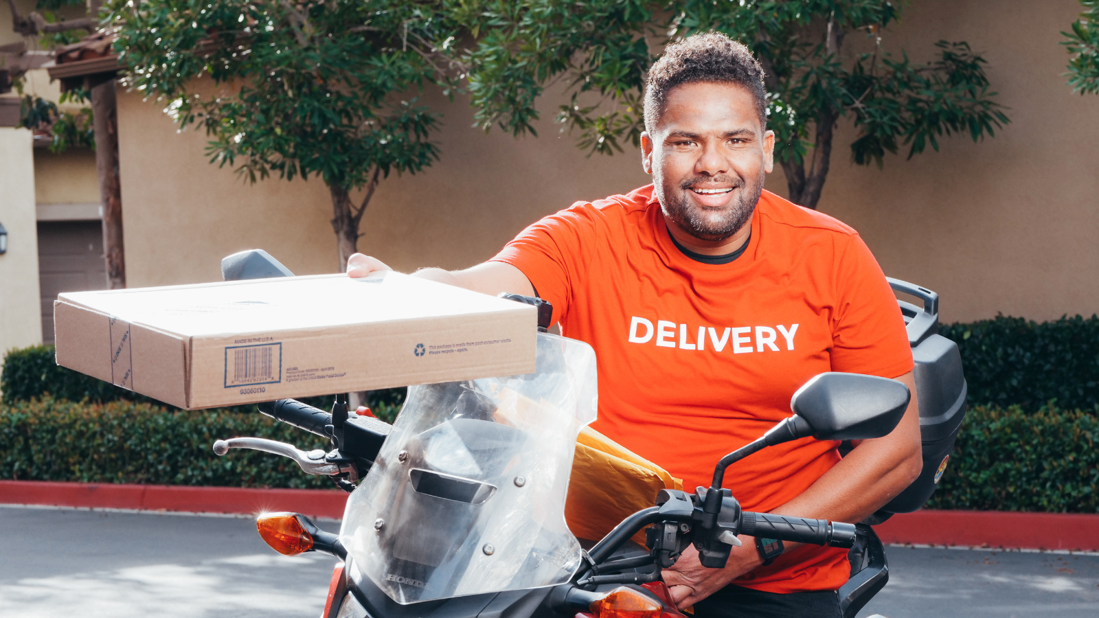 delivery rider fulfilling quick commerce order in urban environment