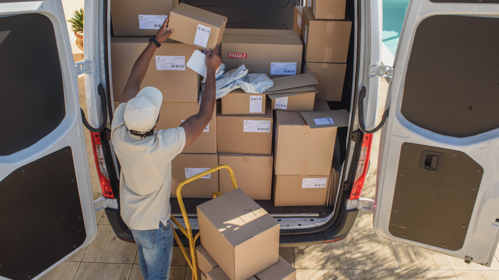 shipping and logistics operations image showing parcel loading and courier dispatch