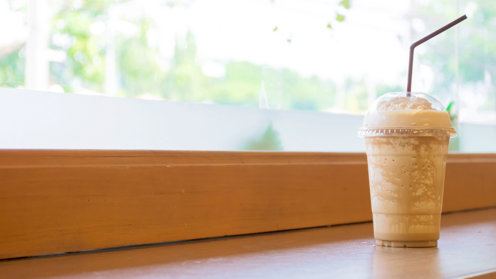 iced coffee drink image representing beverage demand and quick commerce consumption patterns