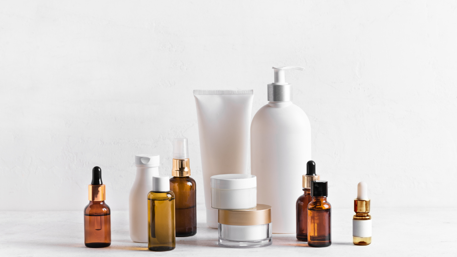 beauty and personal care products image showing skincare bottles and grooming essentials