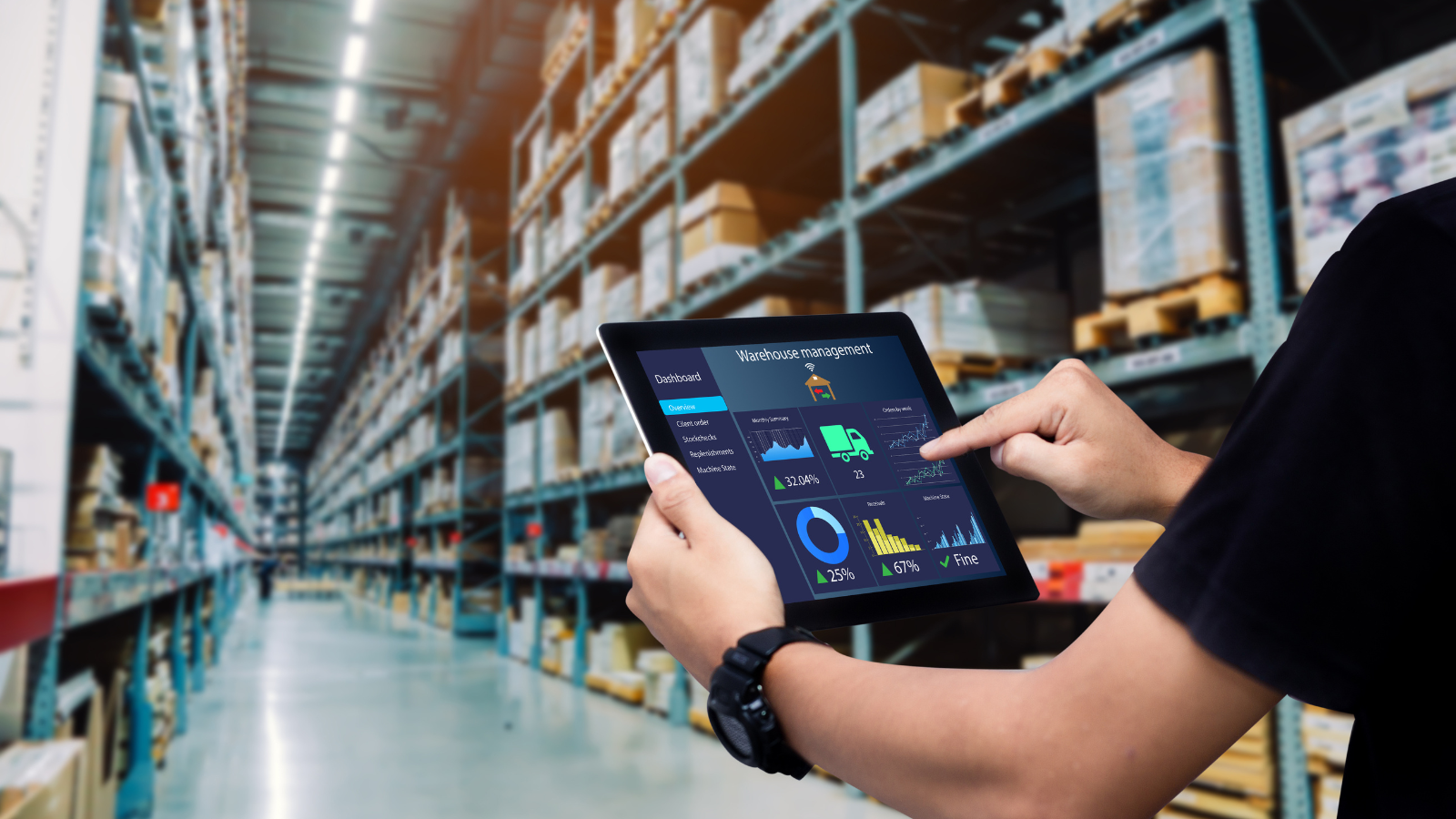 Warehouse employee using inventory management software for real-time warehouse operations