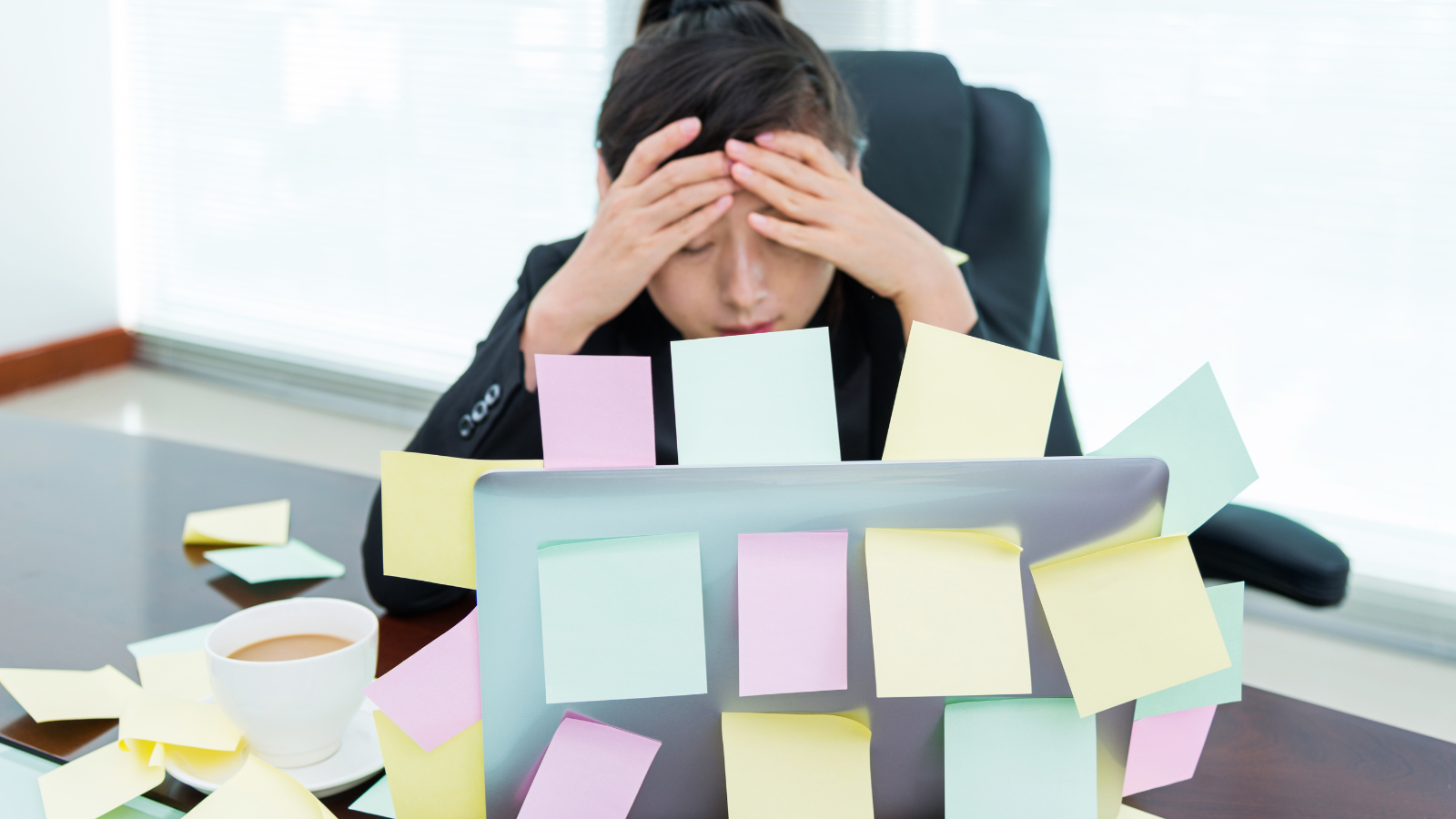 Overworked ecommerce operations manager handling manual workflows