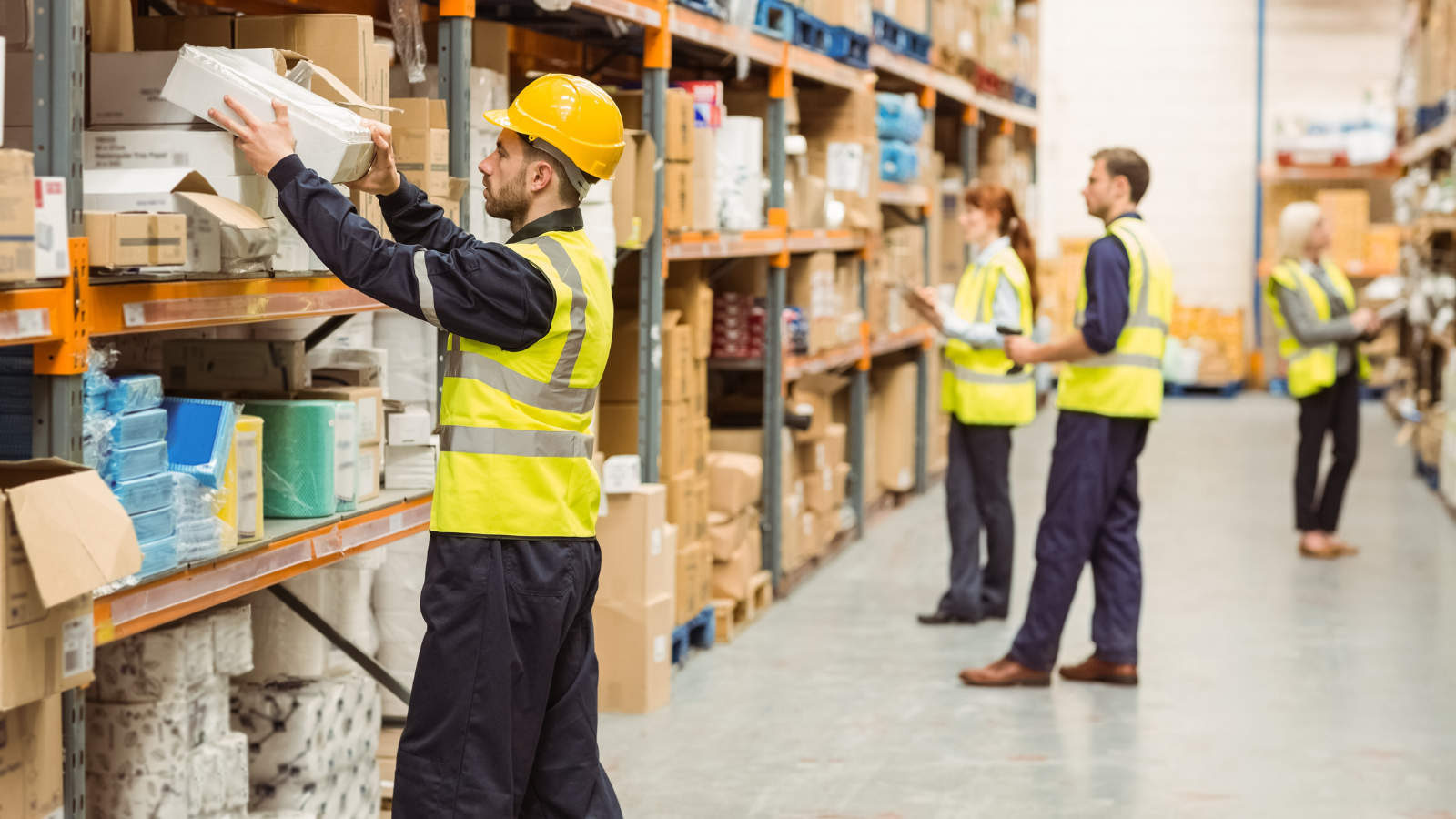Warehouse staff picking inventory for ecommerce order fulfilment