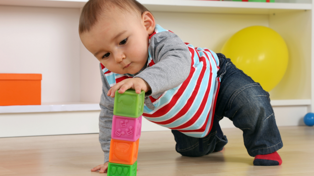 Baby, toys, and juvenile inventory planning showing a child playing with colorful building blocks and gifting-focused demand