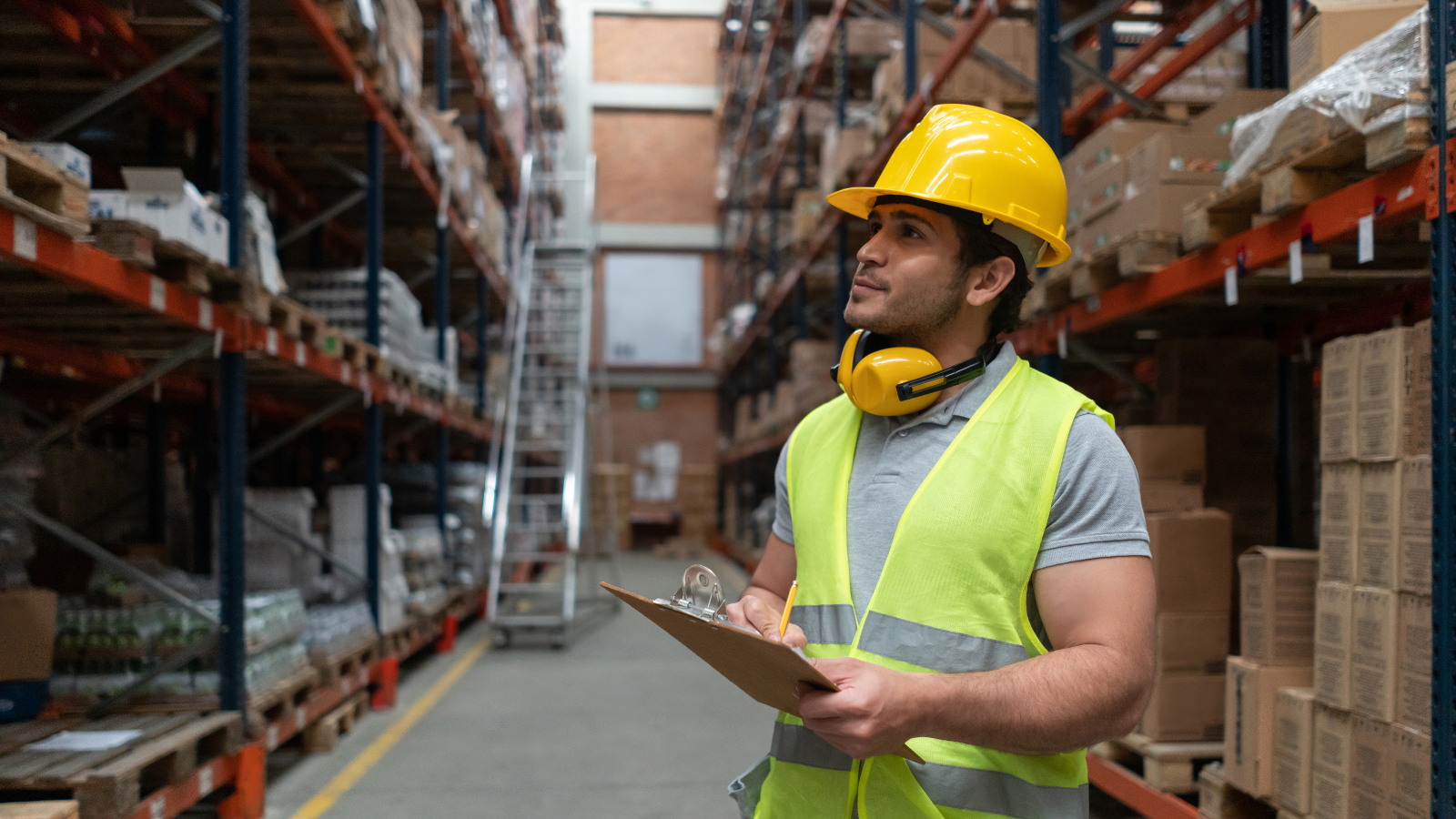 Warehouse manager monitoring inventory across multiple warehouse locations