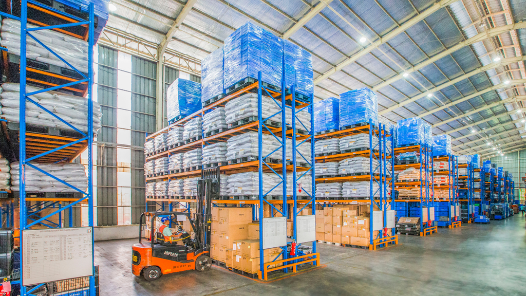 Large warehouse facility illustrating inventory storage and preparation for increased demand during ecommerce sale events