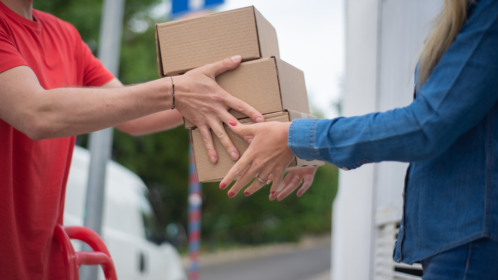 Ecommerce order delivery scene representing the order lifecycle from purchase through shipment and customer delivery