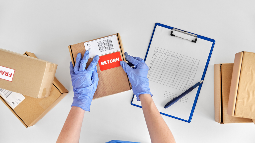 Ecommerce returns processing scene showing returned packages being inspected and managed for reverse logistics
