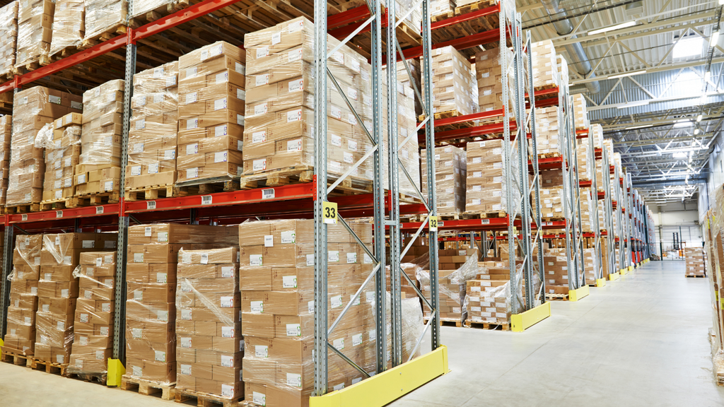 Warehouse inventory storage showing organized stock across racks and aisles for efficient inventory management
