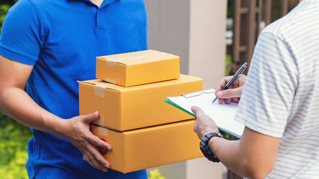 COD delivery and fulfillment scene showing a package handoff between a delivery worker and customer