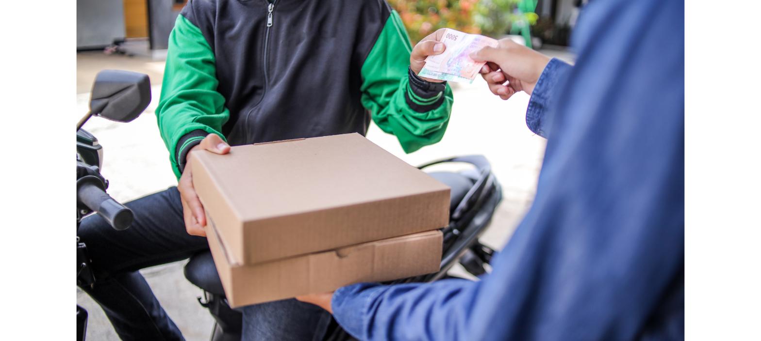 D2C COD order showing a delivery handoff between a courier worker and customer