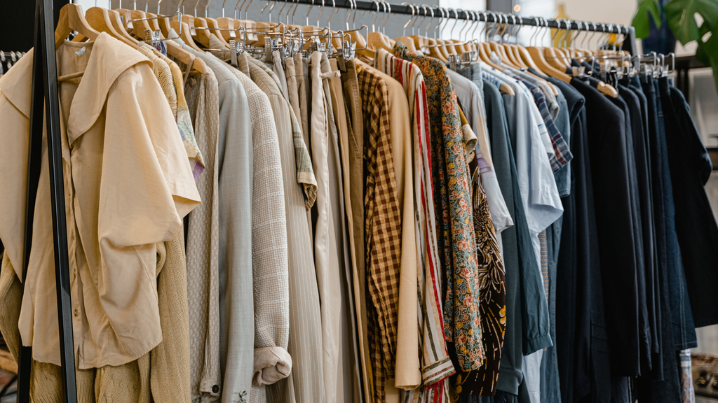 Clothing catalogue with multiple styles and variants, highlighting the need to track each size and colour combination separately.
